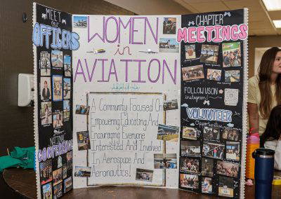 The Women in Aviation chapter display board